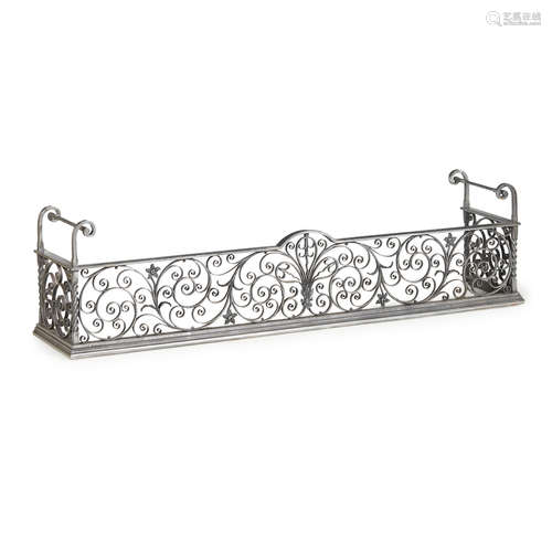 WROUGHT IRON FENDER EARLY 20TH CENTURY the front and side panels with scrolling ironwork and