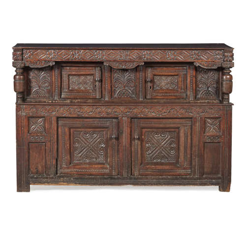 CHARLES I OAK CUPBOARD MID 17TH CENTURY WITH ALTERATIONS the flower head and lozenge carved