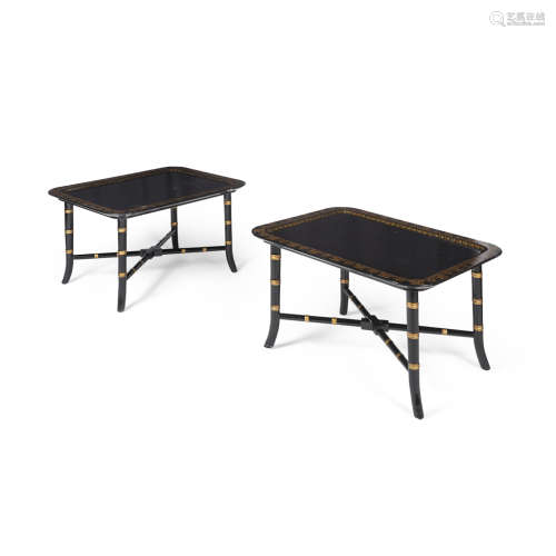 PAIR BLACK LACQUER AND PARCEL GILT LOW TABLES MODERN the rounded rectangular tray tops with gilt