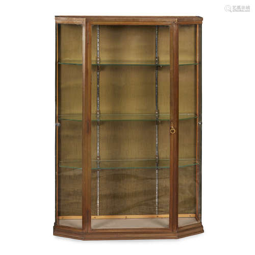 BRONZE AND GLASS DISPLAY CABINET 1920S the glazed door and angled sides enclosing adjustable glass