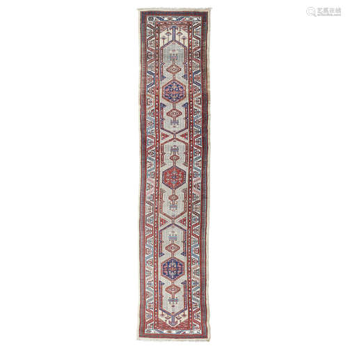 SARAB RUNNER NORTHWEST PERSIA, EARLY/MID 20TH CENTURY the camel field with three indigo and red