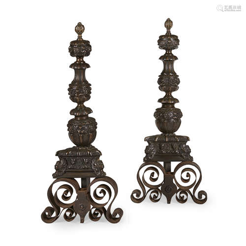 PAIR OF BAROQUE STYLE BRONZE AND STEEL ANDIRONS 19TH CENTURY with lobed mask finials above