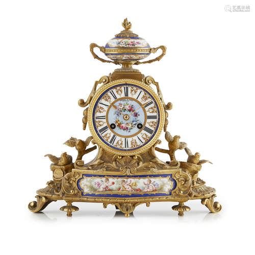 FRENCH PORCELAIN AND GILT BRONZE MANTEL CLOCK 19TH CENTURY in the Louis XVI style, the porcelain