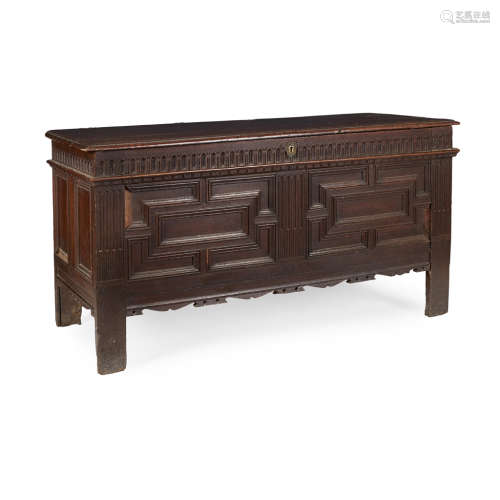 CHARLES II OAK PANEL CHEST 17TH CENTURY the hinged top above a fielded twin-panel front, flanked