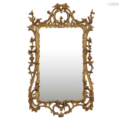 LATE IRISH GEORGE II GILTWOOD MIRROR MID 18TH CENTURY the rectangular mirror plate in a carved