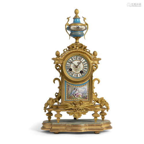 FRENCH GILT BRONZE AND PORCELAIN MOUNTED MANTEL CLOCK 19TH CENTURY in the Louis XVI style,