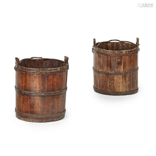 PAIR OF HARDWOOD BUCKETS LATE 18TH CENTURY of rustic staved construction with lugs and swing iron