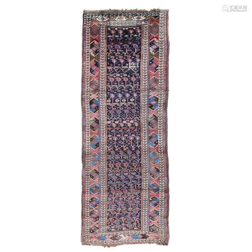 NORTHWEST PERSIAN RUNNER LATE 19TH/EARLY 20TH CENTURY the indigo field with allover stylised boteh