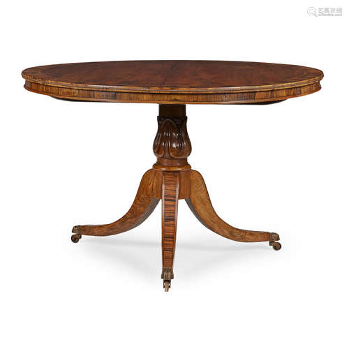 REGENCY ROSEWOOD AND GONCALO ALVES BRASS MOUNTED BREAKFAST TABLE EARLY 19TH CENTURY the