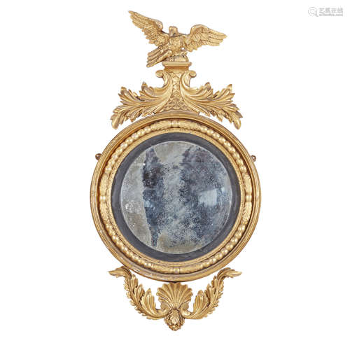 REGENCY GILTWOOD CONVEX MIRROR EARLY 19TH CENTURY the circular mirror plate in a black slip and bead