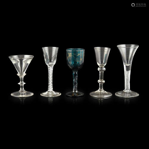 FOUR GEORGIAN WINE GLASSES 18TH CENTURY comprising an example with an opaque twist stem and