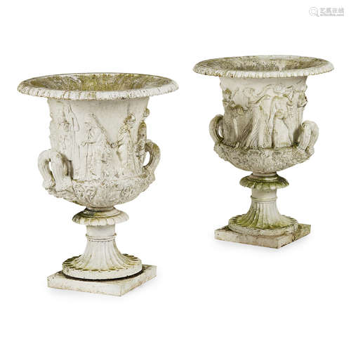 FINE PAIR OF PAINTED CAST IRON 'MEDICI' URNS 19TH CENTURY of campana form with relief cast friezes