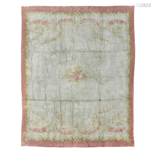 SAVONNERIE STYLE CARPET EUROPE, 20TH CENTURY the plain olive field with small floral medallion,