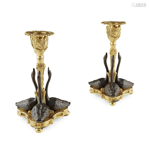 PAIR OF GILT AND PATINATED BRONZE SWAN CANDLESTICKS, DESIGNED BY WILLIAM BATEMAN II FOR RUNDELL,