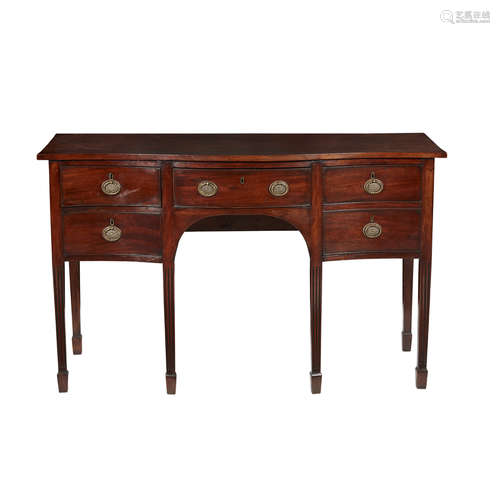 GEORGE III MAHOGANY SERPENTINE SIDEBOARD LATE 18TH CENTURY of neat size, the serpentine top above