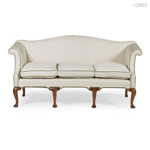 GEORGE II STYLE WALNUT SOFA EARLY 20TH CENTURY the hump back above a three-cushion seat and