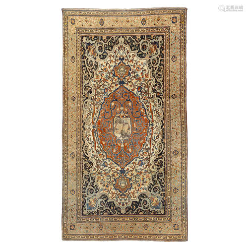 SAROUK FEREGHAN RUG WEST PERSIA, LATE 19TH CENTURY the cream field with red medallion centred by