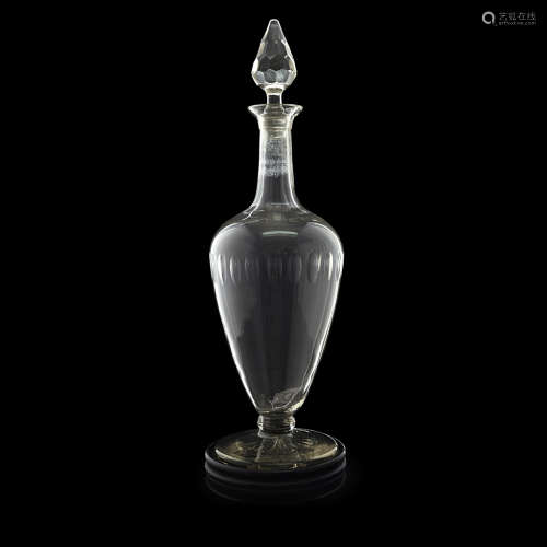 OVERSIZED CUT-GLASS DECANTER AND STOPPER 19TH CENTURY the pointed faceted stopper, above a slim