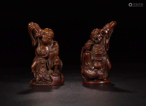 A PAIR OF BAMBOO BUDDHA FIGURES