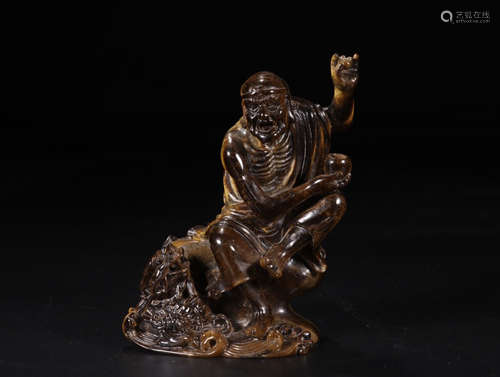 A TIGER'S EYE STONE BUDDHA FIGURE