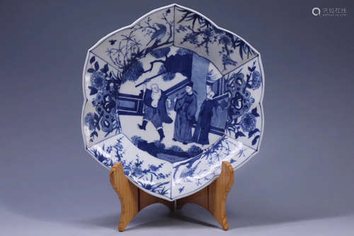 A STORY-TELLING BLUE AND WHITE HEXAGONAL PLATE