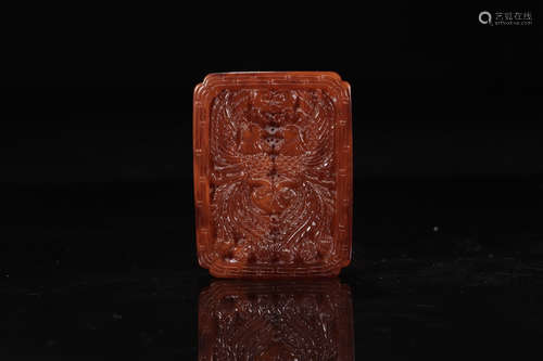 AN AMBER TABLET OF TWO PHOENICES