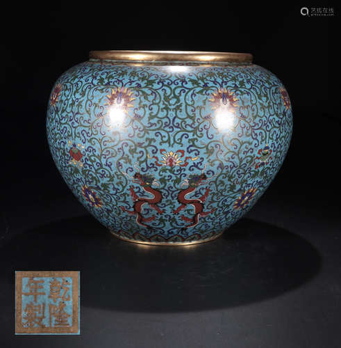 AN ENAMELED WATER POT WITH DRAGON PATTERNS AND QIANLONG MARKING