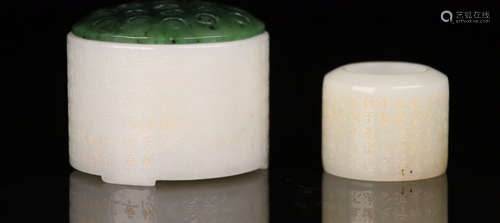 A HETIAN JADE BOX THAT CONTAINS A HETIA JADE THUMB RING