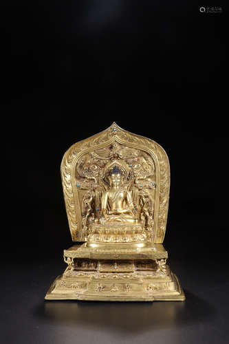 A GILT BRONZE FEMALE BUDDHA FIGURE WITH EIGHT ARMS