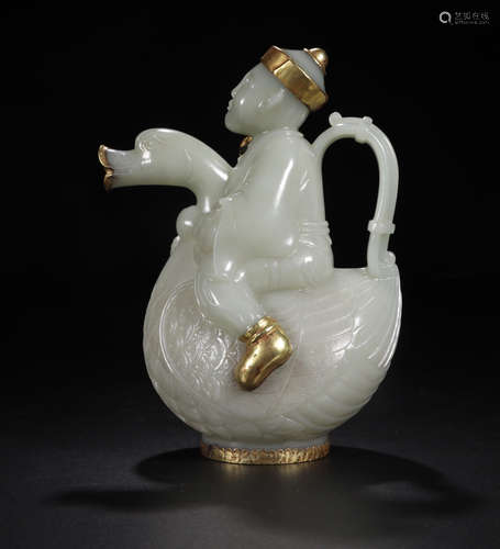 A WHITE HETIAN JADE TEAPOT OF A GOOSE-RIDING CHILD