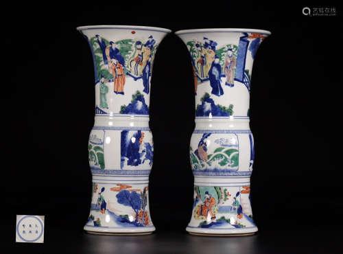 A PAIR OF STORY-TELLING FIVE-COLOR VASES WITH KANGXI MARKING