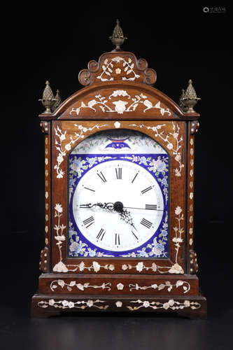 AN ENAMELED BRONZE WESTERN CLOCK