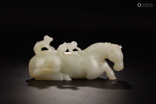 A WHITE HETIAN JADE FISTULA ORNAMENT WITH CLOUD PATTERNS