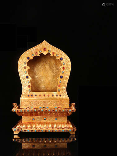 A GILT SILVER ORNAMENT OF BUDDHA'S SHRINE