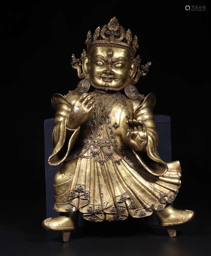 A GILT BRONZE FEMALE BUDDHA FIGURE