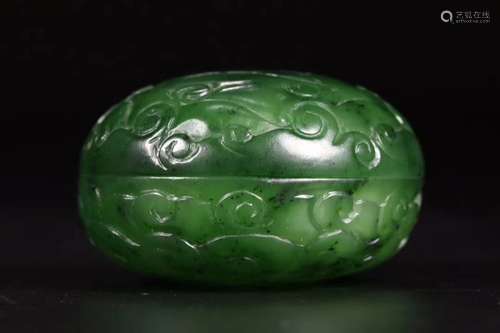 A GREEN JADE CARVED BOX AND COVER