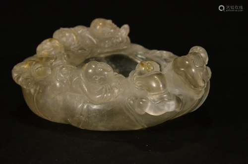 A CARVED CRYSTAL WASHER