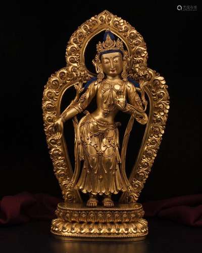 A GILT-BRONZE FIGURE OF TARA