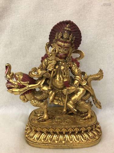 A GILT-BRONZE FIGURE OF GESAR