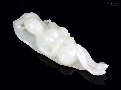 A WHITE JADE FIGURAL ORNAMENT