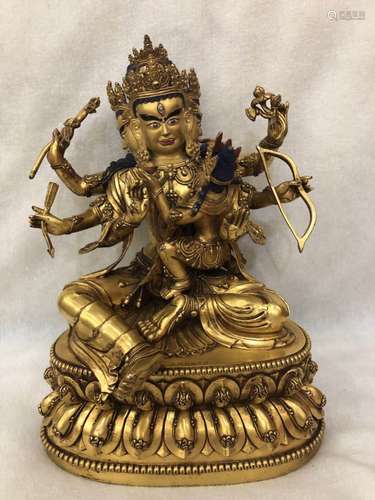 A GILT-BRONZE FIGURE OF USHRISHAVJAYA