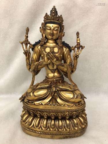 A GILT-BRONZE FIGURE OF TARA