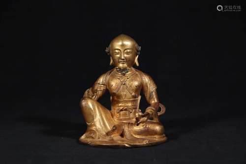 A GILT-BRONZE FIGURE OF BUDDHA