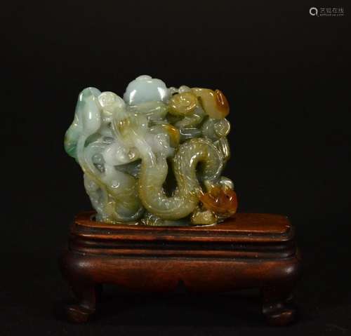 A JADEITE ORNAMENT WITH STAND