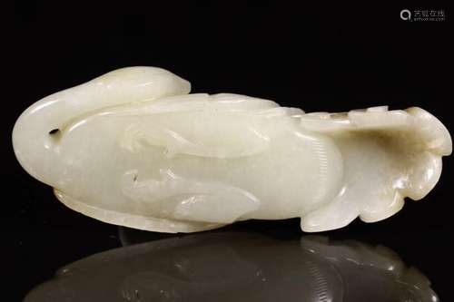 A JADE CARVED ORNAMENT