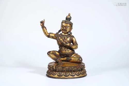 A GILT-BRONZE FIGURE OF BUDDHA