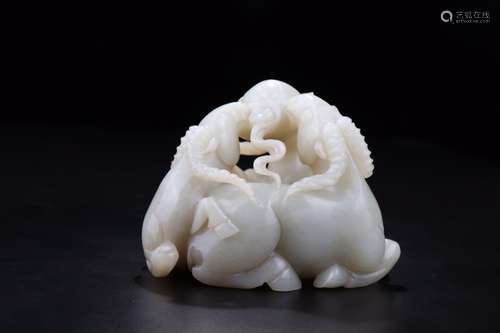 A JADE CARVED ORNAMENT