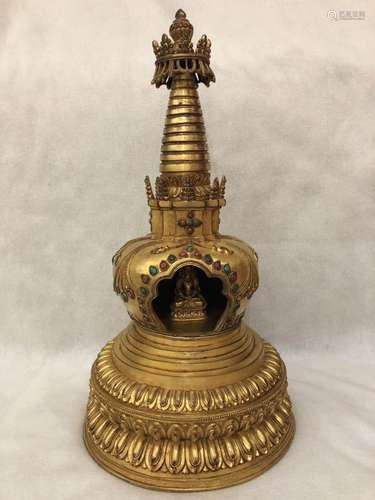 A GILT-BRONZE STUPA