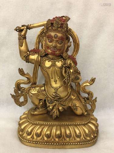 A GILT-BRONZE FIGURE OF GESAR