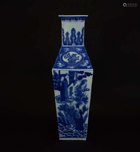 A BLUE AND WHITE FIGURAL VASE